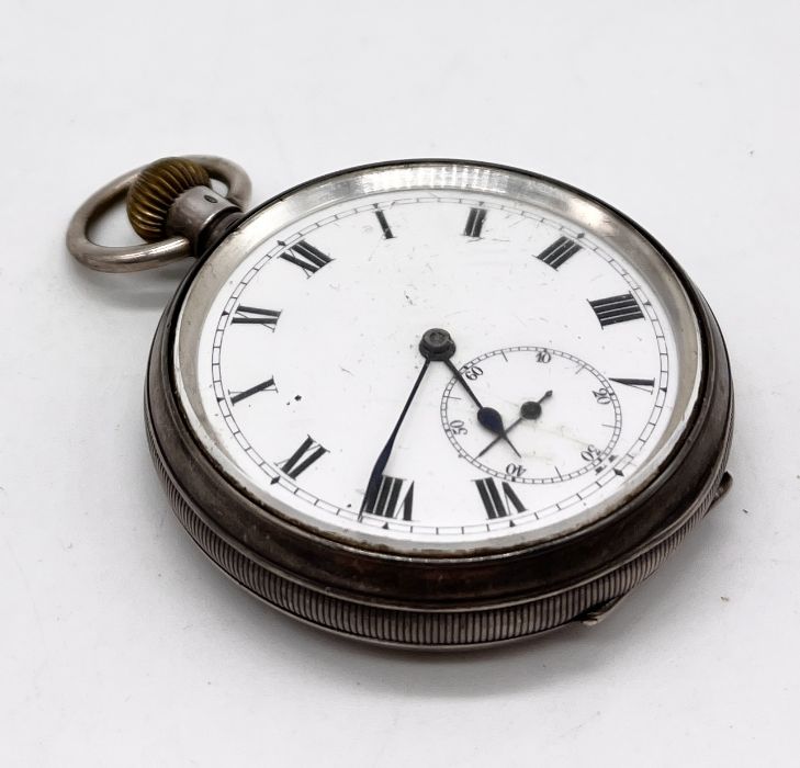 A hallmarked silver pocket watch with subsidiary second hand