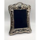 A hallmarked silver photo frame, overall size 22cm x 16cm