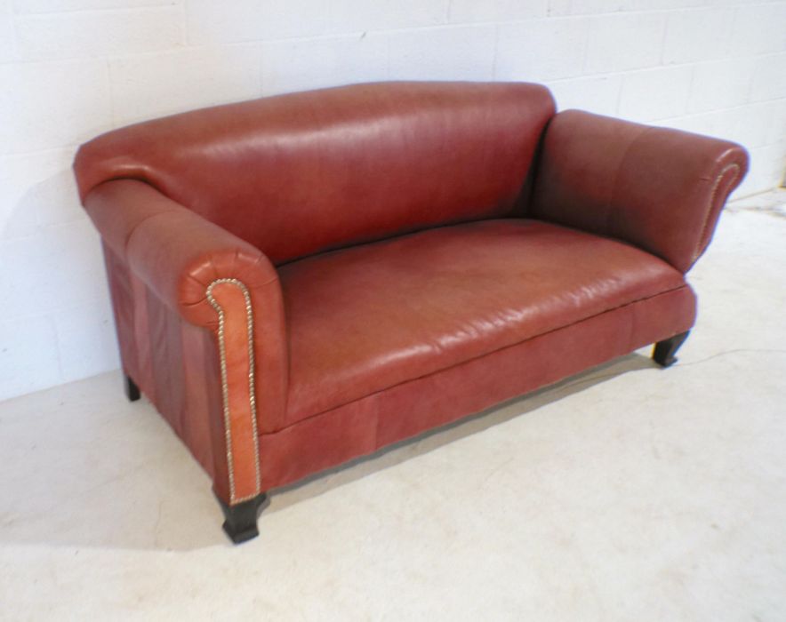 A modern red leather drop-arm sofa with brass stud detailing, length 173cm. - Image 3 of 5