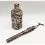 A hallmarked silver Chatelaine holder along with a bottle with filigree silver cover
