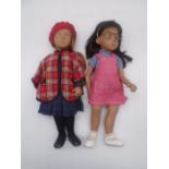 Two unboxed vintage Sasha dolls, one in tartan