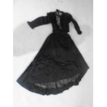 A Victorian black satin dress consisting of full skirt and beaded jacket with lace decoration