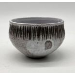 A small studio pottery bowl by the artist Michael Morgan from his estate with incised signature to