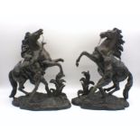 A pair of spelter figures on rearing horses, A/F, height 40cm.