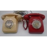 Two vintage rotary telephones.