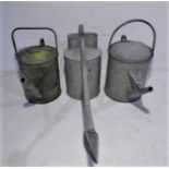 Three vintage galvanised watering cans