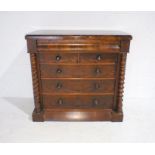 A Victorian Scottish chest of six drawers with inset inlay to top and barley twist supports,