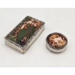 Two hallmarked silver pill pots one with classical scene to lid and the other depicting dogs
