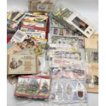 A collection of tea cards and cigarette cards most in albums and some loose