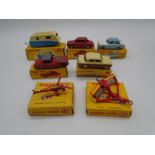 A collection of seven boxed Dinky Toys die-cast models including Renault "Dauphine", Singer Gazelle,