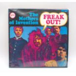 Four 12" vinyl records by Frank Zappa and The Mothers Of Invention including 'Freakout', 'Them Or