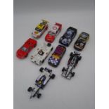 A collection of various vintage Scalextric racing cars