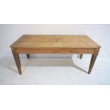 A Victorian scrubbed-top three plank table, length 183cm, depth 82cm, height 75cm.