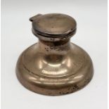 A small hallmarked silver capstan inkwell