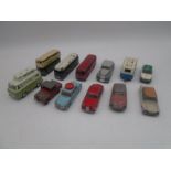 A small collection of twelve vintage playworn die-cast vehicles including Dinky Toys, Corgi Toys etc