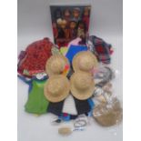A collection of Sasha dolls clothing and accessories including dresses, jumpers, hats, shoes, hair