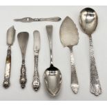 A hallmarked silver serving spoon, continental silver servers, silver handled cutlery etc.