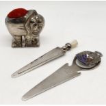 A 925 silver pin cushion in the form of an elephant along with two silver bookmarks