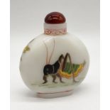 A signed Chinese opaque glass snuff bottle decorated on one side with a cricket, to the other a