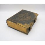A Victorian leather-bound family bible with coloured plates, A/F.