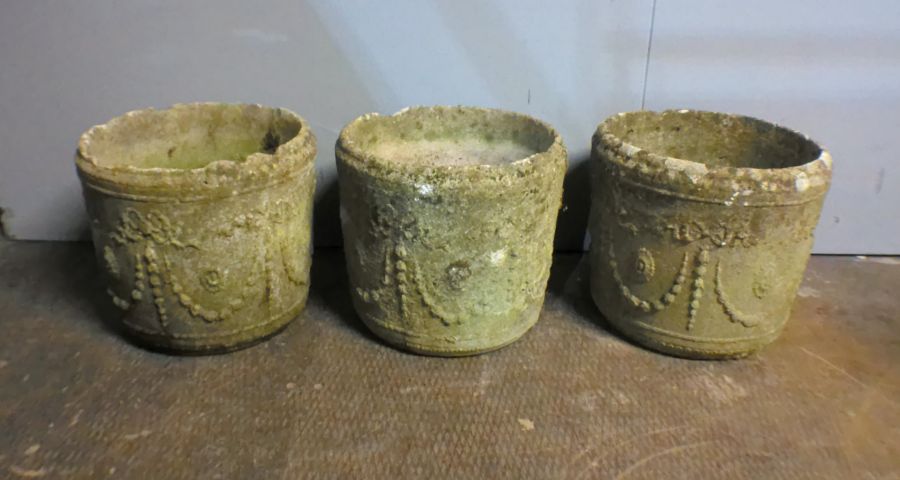 Three reconstituted stone weathered garden pots, A/F, diameter 36cm, height 32cm.