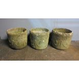 Three reconstituted stone weathered garden pots, A/F, diameter 36cm, height 32cm.