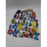 A collection of various toy cars including Hot Wheels, Matchbox, Lledo etc