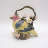 A ceramic teapot in the form of a bird - some repair to beak.