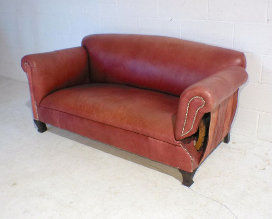 A modern red leather drop-arm sofa with brass stud detailing, length 173cm. - Image 2 of 5