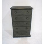 A narrow black painted pine chest of five drawers, length 66cm, depth 40cm, height 110cm.