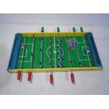 A vintage Charton table top football game