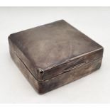 A small silver cigarette box