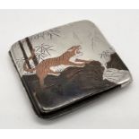A 950 silver Japanese cigarette case decorated with a tiger in a landscape to both inside and