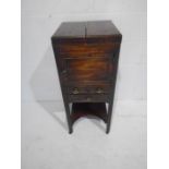 A Georgian mahogany washstand with pull up mirror