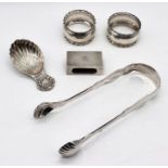 A collection of hallmarked silver including caddy spoon, sugar nips, matchbox holder etc.