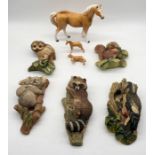 A collection of Bossons animal wall plaques and large ceramic horse along with a smaller Beswick