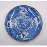 A blue and white ceramic Japanese charger.