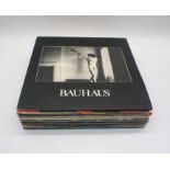 A quantity of 12" vinyl records including Bauhaus, Human League, New Order, All About Eve, The Cars,