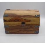 A casket shaped wooden box 35cm x 23cm, height 23cm