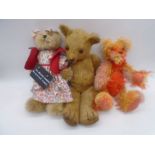 A collection of three vintage teddy bears