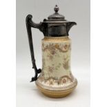 A W. Wood & Co. turn of the century claret jug with silver plated mount, blush colour with floral