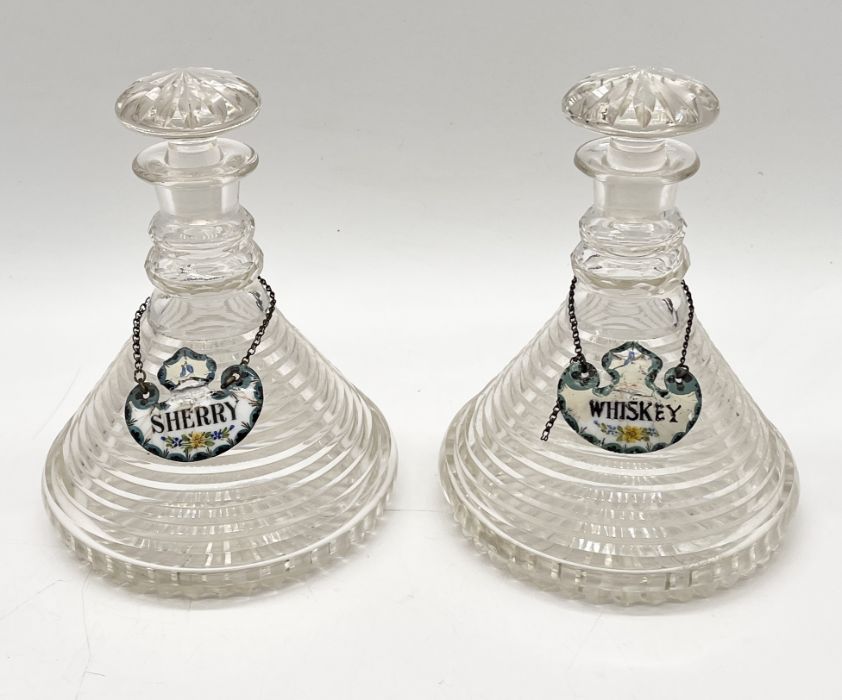 A pair of 19th century ship's decanters with enamel labels (A/F)