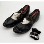 A pair of child's antique leather shoes