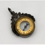 A hallmarked silver miniature compass