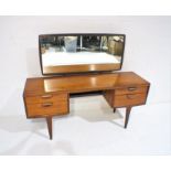 A mid century dressing table with four drawers, length 152cm, depth 46cm, height 123cm.