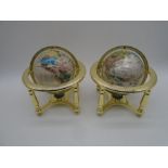 A pair of small gemstone globes with brass supports and compass under - height approx. 25cm
