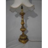 A gilt Ecclesiastical style table lamp with shade, height of lamp 68cm