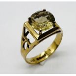 A 9ct gold ring set with smoky quartz