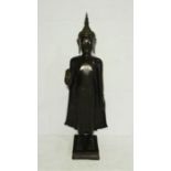 A large Thai bronze standing Buddha in the Vitarka Mudra pose, height 139cm.