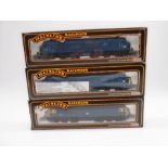 Three boxed Palitoy Mainline Railways OO gauge BR blue livery co-co diesel locomotives including "